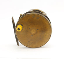 Load image into Gallery viewer, A 1906 rate 4 inch antique brass framed hardy perfect fishing reel  with a ivorine handle shown on a white background