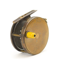 Load image into Gallery viewer, A 1906 rate 4 inch antique brass framed hardy perfect fishing reel  with an ivorine handle shown on a white background This is a prototype