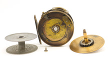 Load image into Gallery viewer, A 1906 rare collectible 4 inch antique brass framed hardy perfect prototype fishing reel  with an ivorine handle shown on a white background