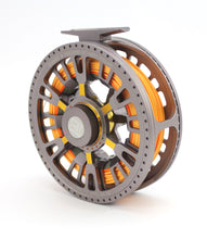 Load image into Gallery viewer, A Hardy Ultralight CA 9000 DD fishing reel with a right-hand configuration, featuring a floating 9 line and a black and orange color scheme with its original case and box