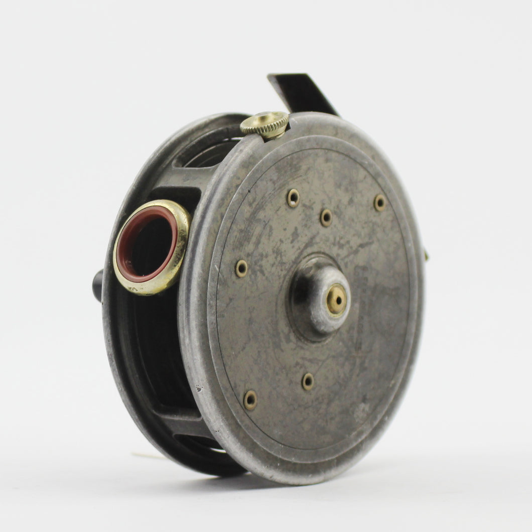 A Rare Red Agate Farlow Stamped Trout Reel 3½